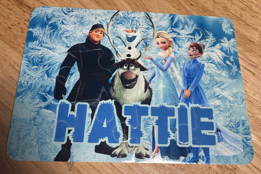 children's 12 piece puzzle with frozen characters with the name HATTIE on it