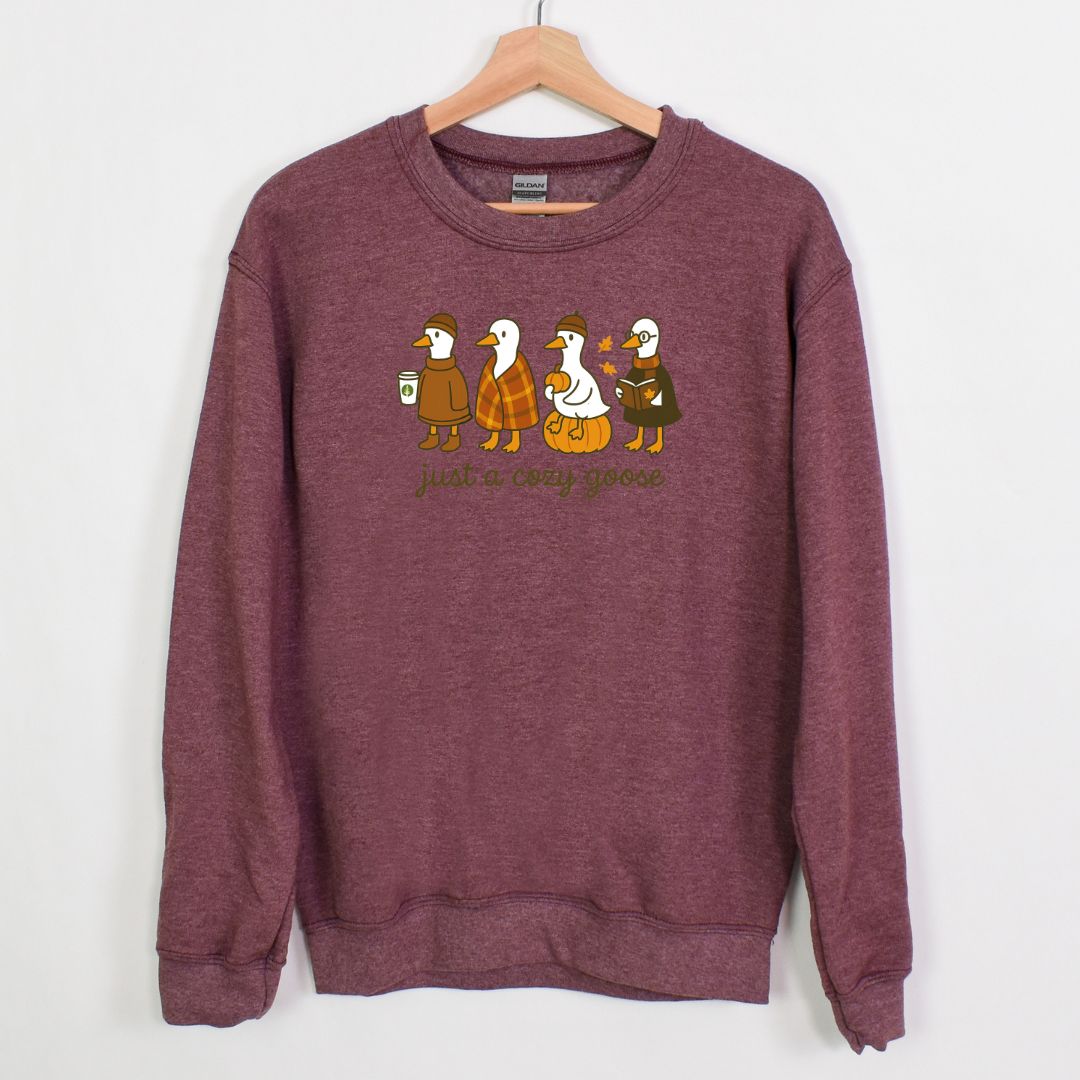 JUST A COZY GOOSE - ADORABLE AND FUN FALL CREWNECK SWEATSHIRT